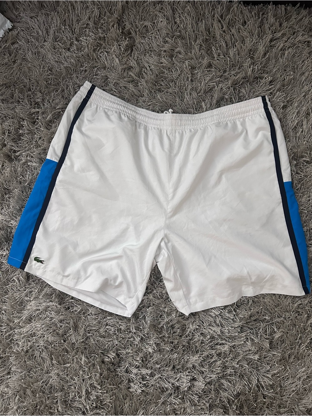Lacoste Men's White Athletic Shorts with Blue Side Panels and Navy Trim